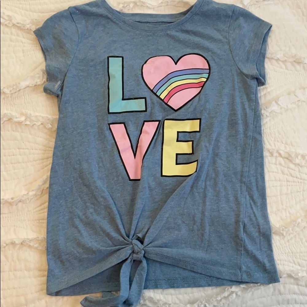 Gently worn, girls front tie shirt. Size M 7/8.